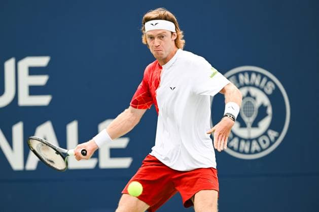 MONTREAL, QC - AUGUST 08: Andrey Rublev returns the ball during a second round match at ATP, Tennis Herren National Bank Open on August 08, 2024 at IGA Stadium in Montreal, QC (Photo by David Kirouac Icon Sportswire) TENNIS: AUG 08 National Bank Open EDITORIAL USE ONLY Icon240808032