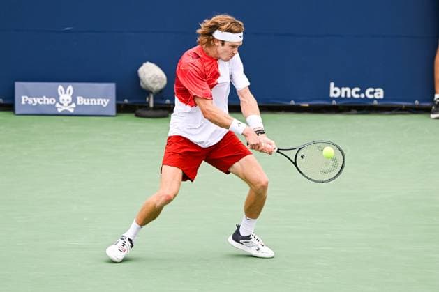 MONTREAL, QC - AUGUST 08: Andrey Rublev returns the ball during a second round match at ATP, Tennis Herren National Bank Open on August 08, 2024 at IGA Stadium in Montreal, QC (Photo by David Kirouac Icon Sportswire) TENNIS: AUG 08 National Bank Open EDITORIAL USE ONLY Icon240808039