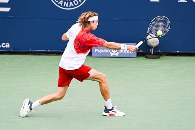 MONTREAL, QC - AUGUST 08: Andrey Rublev returns the ball during a second round match at ATP, Tennis Herren National Bank Open on August 08, 2024 at IGA Stadium in Montreal, QC (Photo by David Kirouac Icon Sportswire) TENNIS: AUG 08 National Bank Open EDITORIAL USE ONLY Icon240808040