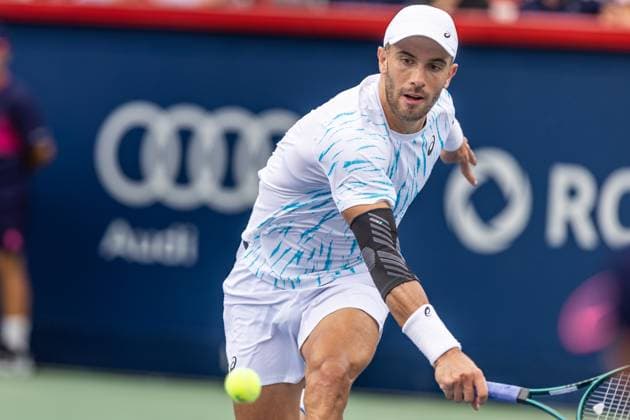 August 8, 2024, Montreal, Quebec, Canada: BORNA CORIC from Croatia returning ball in second set against Jannik Sinner from Italia in second round of Canadian Open at IGA Stadium in Montreal, Quebec, Canada Montreal Canada - ZUMAl189 20240808_zsp_l189_061 Copyright: xYannickxLegarex