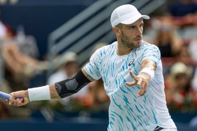 August 8, 2024, Montreal, Quebec, Canada: BORNA CORIC from Croatia returning ball in second set against Jannik Sinner from Italia in second round of Canadian Open at IGA Stadium in Montreal, Quebec, Canada Montreal Canada - ZUMAl189 20240808_zsp_l189_067 Copyright: xYannickxLegarex