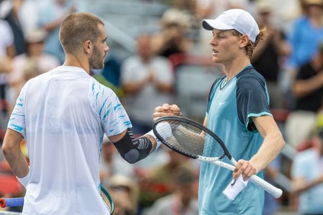 August 8, 2024, Montreal, Quebec, Canada: JANNIK SINNER from Italia and BORNA CORIC from Croatia shaking hands after their match in second round of Canadian Open at IGA Stadium in Montreal, Quebec, Canada Montreal Canada - ZUMAl189 20240808_zsp_l189_075 Copyright: xYannickxLegarex