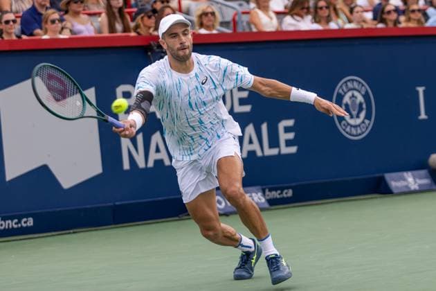 August 8, 2024, Montreal, Quebec, Canada: BORNA CORIC from Croatia returning ball in second set against Jannik Sinner from Italia in second round of Canadian Open at IGA Stadium in Montreal, Quebec, Canada Montreal Canada - ZUMAl189 20240808_zsp_l189_077 Copyright: xYannickxLegarex