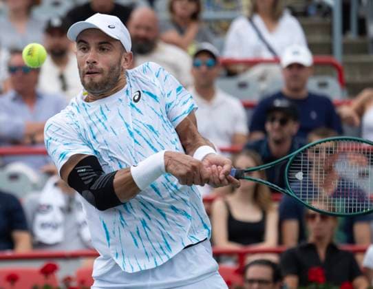 August 8, 2024, Montreal, Pq, Canada: Croatia s Borna Coric returns a shot to Italy s Jannik Sinner during their second round match at the National Bank Open tennis Thursday, August 8, 2024 in Montreal. Sinner won the match in straight sets. Borna Coric,  - ZUMAc35_ 20240808_zaf_c35_151 Copyright: xRyanxRemiorzx