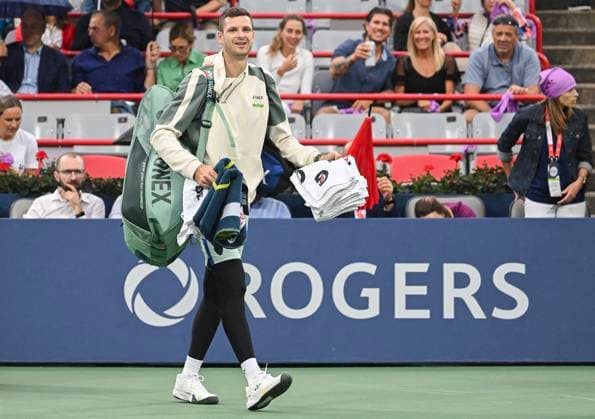August 8, 2024, Montreal, Pq, Canada: Hubert Hurkacz of Poland walks off court during a rain stoppage ahead of his second round match against Thanasi Kokkinakis of Australia at the National Bank Open tennis tournament in Montreal, Thursday, August 8, 2024. Hubert Hurkacz, Thanasi Kokkinakis,  - ZUMAc35_ 20240808_zaf_c35_161 Copyright: xGrahamxHughesx