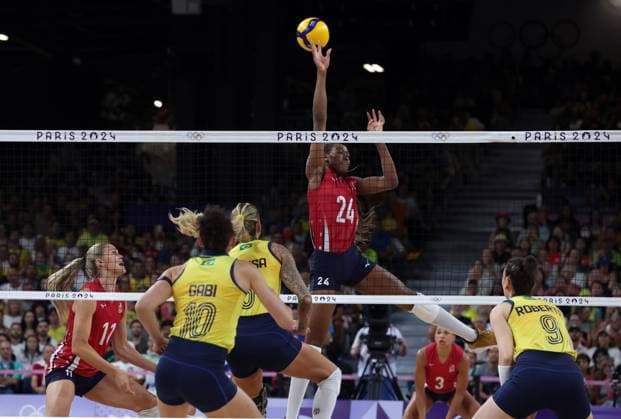 Team USA (red jersey) plays against Team Brazil (yellow jersey) during the Women s Volleyball semi-final of the 2024 Summer Olympics at the South Arena, in Paris, France, on Thursday, August 8, 2024. Team USA qualified for the final.  OLY20240808613 MAYAxVIDON-WHITE
