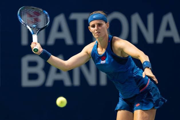 TORONTO, ON - AUGUST 08: Greet Minnen of Belgium hits a shot during her second round match of the National Bank Open, part of the WTA, Tennis Damen Tour, at Sobeys Stadium on August 8, 2024 in Toronto, Canada. (Photo by Julian Avram Icon Sportswire) TENNIS: AUG 08 National Bank Open EDITORIAL USE ONLY Icon2408080424