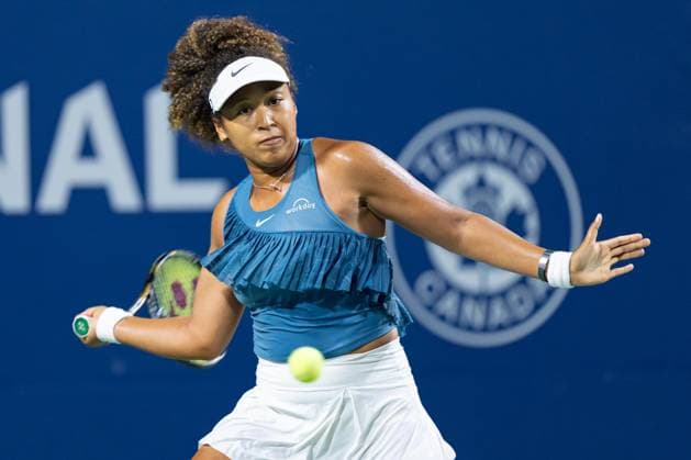 TORONTO, ON - AUGUST 08: Naomi Osaka of Japan hits a shot during her second round match of the National Bank Open, part of the WTA, Tennis Damen Tour, at Sobeys Stadium on August 8, 2024 in Toronto, Canada. (Photo by Julian Avram Icon Sportswire) TENNIS: AUG 08 National Bank Open EDITORIAL USE ONLY Icon2408080494