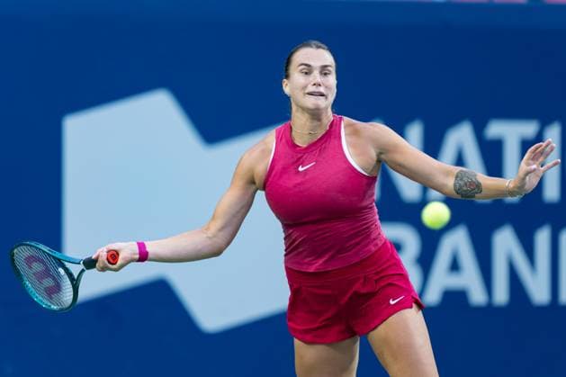 TORONTO, ON - AUGUST 08: Aryna Sabalenka of Russia hits a shot during her second round match of the National Bank Open, part of the WTA, Tennis Damen Tour, at Sobeys Stadium on August 8, 2024 in Toronto, Canada. (Photo by Julian Avram Icon Sportswire) TENNIS: AUG 08 National Bank Open EDITORIAL USE ONLY Icon2408080367