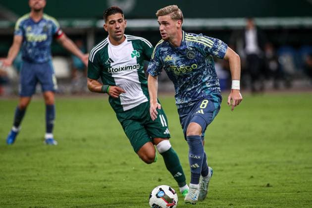 2024-08-08 Panathinaikos FC v AFC Ajax - Europa League Qualifier Third Round - 1st leg ATHENS, NETHERLANDS - AUGUST 8: Anastasios Bakasetas of Panathinaikos FC, Kenneth Taylor of AFC Ajax battle for the ball during the Europa League Qualifier Third Round - 1st leg match between Panathinaikos FC and AFC Ajax at Olympic Stadium Spyridon Louis on August 8, 2024 in Athens, Netherlands. Athens Olympic Stadium Spyridon Louis Netherlands Content not available for redistribution in The Netherlands directly or indirectly through any third parties. Copyright: xx
