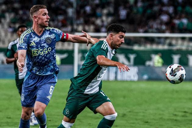 2024-08-08 Panathinaikos FC v AFC Ajax - Europa League Qualifier Third Round - 1st leg ATHENS, NETHERLANDS - AUGUST 8: Jordan Henderson of AFC Ajax, Dimitris Limnios of Panathinaikos FC battle for the ball during the Europa League Qualifier Third Round - 1st leg match between Panathinaikos FC and AFC Ajax at Olympic Stadium Spyridon Louis on August 8, 2024 in Athens, Netherlands. Athens Olympic Stadium Spyridon Louis Netherlands Content not available for redistribution in The Netherlands directly or indirectly through any third parties. Copyright: xx