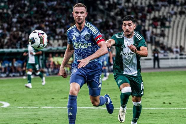 2024-08-08 Panathinaikos FC v AFC Ajax - Europa League Qualifier Third Round - 1st leg ATHENS, NETHERLANDS - AUGUST 8: Jordan Henderson of AFC Ajax, Dimitris Limnios of Panathinaikos FC battle for the ball during the Europa League Qualifier Third Round - 1st leg match between Panathinaikos FC and AFC Ajax at Olympic Stadium Spyridon Louis on August 8, 2024 in Athens, Netherlands. Athens Olympic Stadium Spyridon Louis Netherlands Content not available for redistribution in The Netherlands directly or indirectly through any third parties. Copyright: xx