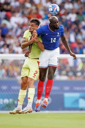 August 9, 2024, Paris, France: MARC PUBILL (2) of Spain and JEAN-PHILIPPE MATETA (14) of France jump for the ball during the menÃ¢â‚¬â ¢s final match of the 2024 Olympic Games, Olympische Spiele, Olympia, OS Football Tournament between France and Spain at the Parc des Princes stadium in Paris, France. Paris France - ZUMAl303 20240809_oly_l303_016 Copyright: xSydneyxLowx