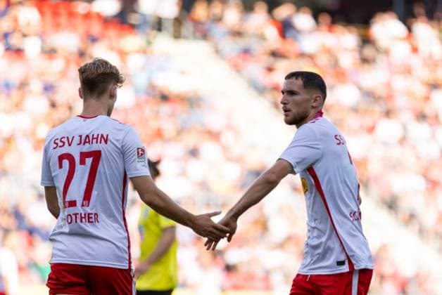 09 08 2024, Soccer, GER, Season, 2 Liga, Season 2024 2025, SSV Jahn Regensburg SSV Ulm 1846 Soccer Dominik Kother SSV Jahn Regensburg and Oscar Schönfelder SSV Jahn Regensburg DFL REGULATIONS PROHIBIT ANY USE OF PHOTOGRAPHS AS IMAGE SEQUENCES AND OR QUASI VIDEO Regensburg Bavaria Germany Jahnstadion Regensburg