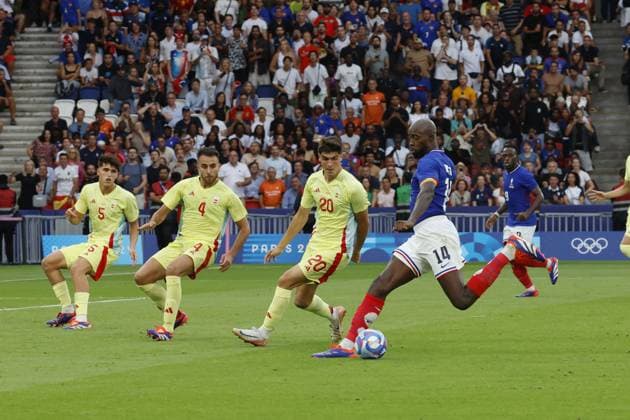 Jean-Philippe Mateta of France and Juanlu Sánchez, Eric García of Spain, Football, Men s Gold Medal Match between France and Spain during the Olympic Games, Olympische Spiele, Olympia, OS Paris 2024 on 9 August 2024 at Parc des Princes in Paris, France - Photo Gregory Lenormand DPPI Media Panoramic OLYMPIC GAMES PARIS 2024 - 09 08 DPPI Panoramic  21024017_GRL_65855