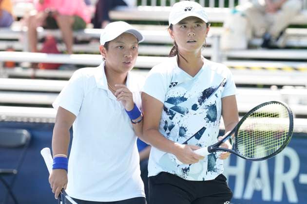 August 9, 2024, Toronto, On, CAN: China s Jiang Xinyu (left) talks with her doubles partner, Taiwan s Wu Fang-Hsien as they take on the United States Bethanie Mattek-Sands and Sofia Kenin at the National Bank Open in Toronto on Friday, August 9, 2024. Jiang Xinyu; Wu Fang-Hsien  - ZUMAc35_ 20240809_zaf_c35_144 Copyright: xChrisxYoungx