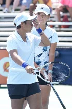August 9, 2024, Toronto, On, CAN: China s Jiang Xinyu (left) talks with her doubles partner, Taiwan s Wu Fang-Hsien as they take on the United States Bethanie Mattek-Sands and Sofia Kenin at the National Bank Open in Toronto on Friday, August 9, 2024. Jiang Xinyu; Wu Fang-Hsien  - ZUMAc35_ 20240809_zaf_c35_145 Copyright: xChrisxYoungx