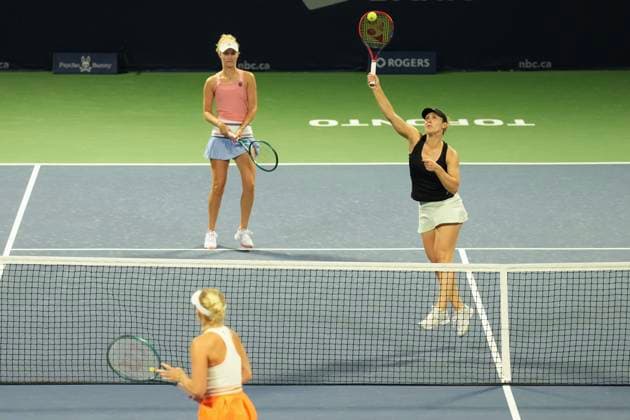 August 9, 2024, Toronto, On, CAN: Gabriela Dabrowski of Canada hits a return as she, and doubles partner Erin Routliffe from New Zealand play against Magda Linette of Poland and Peyton Stearns of the United States at the National Bank Open in Toronto on Friday, August 9, 2024. Gabriela Dabrowski; Erin Routliffe  - ZUMAc35_ 20240809_zaf_c35_229 Copyright: xChrisxYoungx