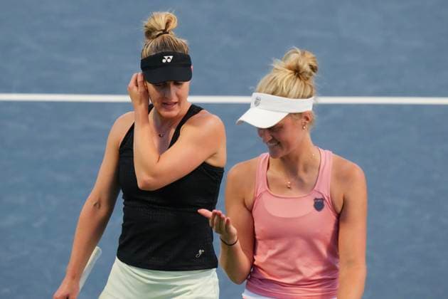 August 9, 2024, Toronto, On, CAN: Gabriela Dabrowski of Canada (left) and doubles partner Erin Routliffe of New Zealand regroup during their match against Magda Linette of Poland and Peyton Stearns of the United States at the National Bank Open in Toronto on Friday, August 9, 2024. Gabriela Dabrowski  - ZUMAc35_ 20240809_zaf_c35_231 Copyright: xChrisxYoungx