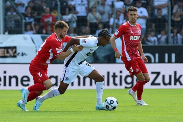 10 08 2024, Football, Men, 2 Bundesliga, Season 2024 2025, SV 07 Elversberg 1 FC Köln, Filimon Gerezgiher SV 07 Elversberg , Jan Thielmann 1 FC Koeln , Dejan Ljubicic 1 FC Koeln Elversberg Ursapharm Arena an der Kaiserlinde Saarland Germany EN Copyright: xSebastianxBachx