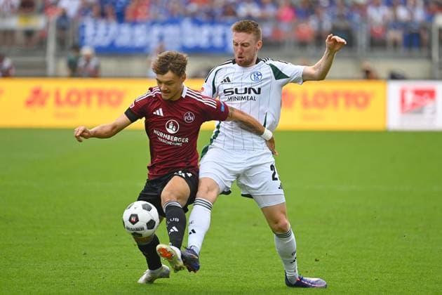 Jannik HOFMANN 1 FC Nuernberg , action,duel against Tobias MOHR FC Schalke 04 Soccer 2 Bundesliga 1 FC Nuernberg FC Schalke 04 2 Matchday on 10 08 2023 Max Morlock Stadion Nuernberg, Season 2024 25
