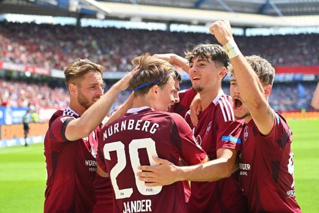 collective goal celebration around Caspar JANDER 1 FC Nuernberg after goal to 1 1 with ,jubilation,joy,enthusiasm, action football 2 Bundesliga 1 FC Nuernberg FC Schalke 04 2 matchday on 10 08 2023 Max Morlock Stadium Nuernberg, season 2024 25