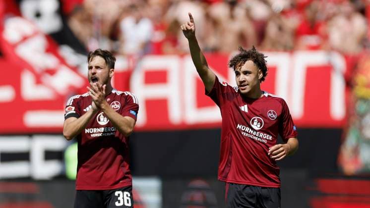 from left Lukas Schleimer 1 FC Nuernberg, 36 and goal scorer Rafael Lubach 1 FC Nuernberg, 18 cheering after the goal for 3 1, cheering, cheering, cheering, emotions, 10 08 2024, Soccer, 2 Bundesliga, 2 Matchday, 1 FC Nuernberg FC Schalke 04, GER, Nuernberg, Max Morlock Stadion, DFL REGULATES PROHIBIT ANY USE OF PHOTOGRAPHS AS IMAGE SEQUENCES AND OR QUASI VIDEO Copyright: HMBxMedia xHeikoxBecker