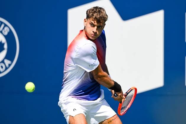 MONTREAL, QC - AUGUST 10: Flavio Cobolli (ITA) returns the ball during a second round match at ATP, Tennis Herren National Bank Open on August 10, 2024 at IGA Stadium in Montreal, QC (Photo by David Kirouac Icon Sportswire) TENNIS: AUG 10 National Bank Open EDITORIAL USE ONLY Icon240810003