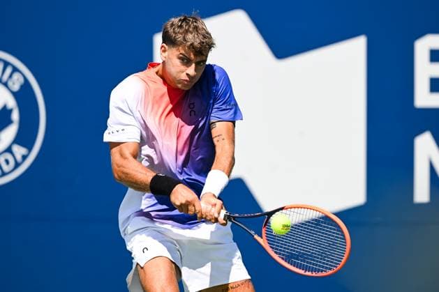 MONTREAL, QC - AUGUST 10: Flavio Cobolli (ITA) returns the ball during a second round match at ATP, Tennis Herren National Bank Open on August 10, 2024 at IGA Stadium in Montreal, QC (Photo by David Kirouac Icon Sportswire) TENNIS: AUG 10 National Bank Open EDITORIAL USE ONLY Icon240810004