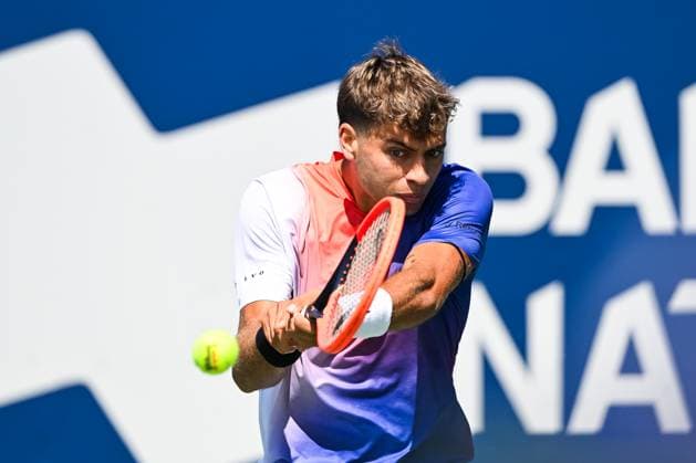 MONTREAL, QC - AUGUST 10: Flavio Cobolli (ITA) returns the ball during a second round match at ATP, Tennis Herren National Bank Open on August 10, 2024 at IGA Stadium in Montreal, QC (Photo by David Kirouac Icon Sportswire) TENNIS: AUG 10 National Bank Open EDITORIAL USE ONLY Icon240810005