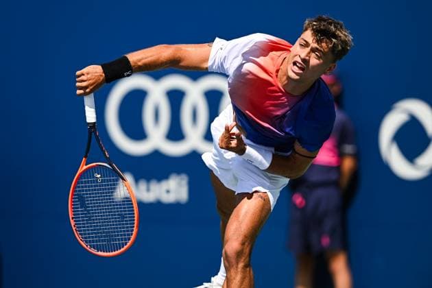 MONTREAL, QC - AUGUST 10: Flavio Cobolli (ITA) serves the ball during a second round match at ATP, Tennis Herren National Bank Open on August 10, 2024 at IGA Stadium in Montreal, QC (Photo by David Kirouac Icon Sportswire) TENNIS: AUG 10 National Bank Open EDITORIAL USE ONLY Icon240810007