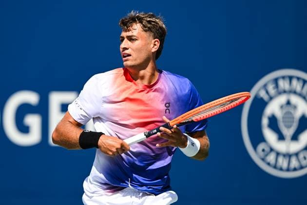 MONTREAL, QC - AUGUST 10: Flavio Cobolli (ITA) returns the ball during a second round match at ATP, Tennis Herren National Bank Open on August 10, 2024 at IGA Stadium in Montreal, QC (Photo by David Kirouac Icon Sportswire) TENNIS: AUG 10 National Bank Open EDITORIAL USE ONLY Icon240810008