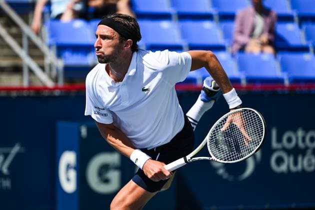 MONTREAL, QC - AUGUST 10: Arthur Rinderknech (FRA) serves the ball during a second round match at ATP, Tennis Herren National Bank Open on August 10, 2024 at IGA Stadium in Montreal, QC (Photo by David Kirouac Icon Sportswire) TENNIS: AUG 10 National Bank Open EDITORIAL USE ONLY Icon240810010