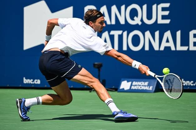 MONTREAL, QC - AUGUST 10: Arthur Rinderknech (FRA) returns the ball during a second round match at ATP, Tennis Herren National Bank Open on August 10, 2024 at IGA Stadium in Montreal, QC (Photo by David Kirouac Icon Sportswire) TENNIS: AUG 10 National Bank Open EDITORIAL USE ONLY Icon240810019