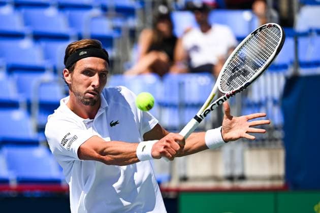 MONTREAL, QC - AUGUST 10: Arthur Rinderknech (FRA) returns the ball during a second round match at ATP, Tennis Herren National Bank Open on August 10, 2024 at IGA Stadium in Montreal, QC (Photo by David Kirouac Icon Sportswire) TENNIS: AUG 10 National Bank Open EDITORIAL USE ONLY Icon240810022