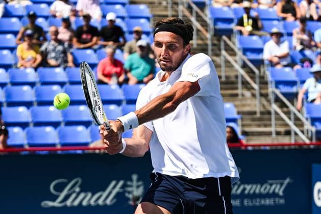 MONTREAL, QC - AUGUST 10: Arthur Rinderknech (FRA) returns the ball during a second round match at ATP, Tennis Herren National Bank Open on August 10, 2024 at IGA Stadium in Montreal, QC (Photo by David Kirouac Icon Sportswire) TENNIS: AUG 10 National Bank Open EDITORIAL USE ONLY Icon240810025