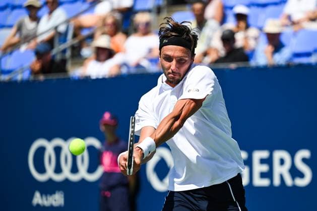 MONTREAL, QC - AUGUST 10: Arthur Rinderknech (FRA) returns the ball during a second round match at ATP, Tennis Herren National Bank Open on August 10, 2024 at IGA Stadium in Montreal, QC (Photo by David Kirouac Icon Sportswire) TENNIS: AUG 10 National Bank Open EDITORIAL USE ONLY Icon240810026