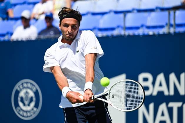 MONTREAL, QC - AUGUST 10: Arthur Rinderknech (FRA) returns the ball during a second round match at ATP, Tennis Herren National Bank Open on August 10, 2024 at IGA Stadium in Montreal, QC (Photo by David Kirouac Icon Sportswire) TENNIS: AUG 10 National Bank Open EDITORIAL USE ONLY Icon240810027
