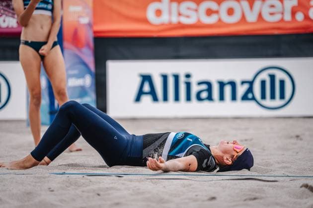 Beach volleyball women Allianz German Beach Tour 2024 Tourstop Kühlungsborn 10 08 2024 Melanie Gernert lies on the ground Kühlungsborn beach at the pier Mecklenburg Western Pomerania Germany