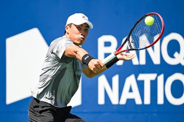 MONTREAL, QC - AUGUST 10: Brandon Nakashima (USA) returns the ball during a third round match at ATP, Tennis Herren National Bank Open on August 10, 2024 at IGA Stadium in Montreal, QC (Photo by David Kirouac Icon Sportswire) TENNIS: AUG 10 National Bank Open EDITORIAL USE ONLY Icon240810050