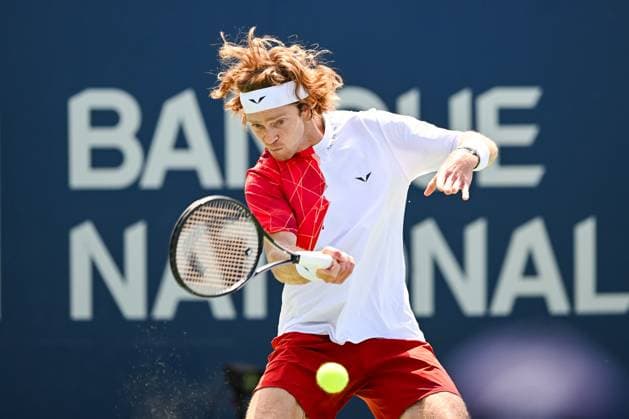 MONTREAL, QC - AUGUST 10: Andrey Rublev returns the ball during a third round match at ATP, Tennis Herren National Bank Open on August 10, 2024 at IGA Stadium in Montreal, QC (Photo by David Kirouac Icon Sportswire) TENNIS: AUG 10 National Bank Open EDITORIAL USE ONLY Icon240810054