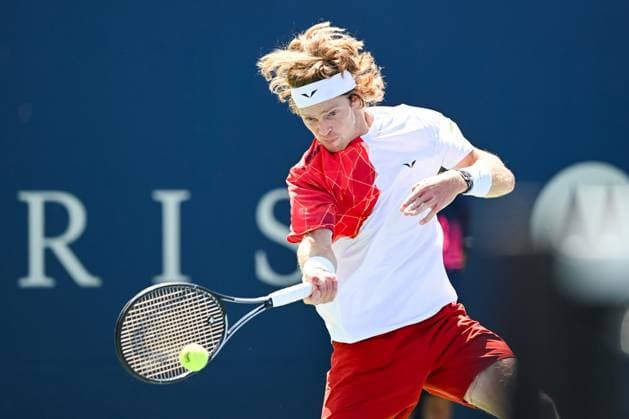 MONTREAL, QC - AUGUST 10: Andrey Rublev returns the ball during a third round match at ATP, Tennis Herren National Bank Open on August 10, 2024 at IGA Stadium in Montreal, QC (Photo by David Kirouac Icon Sportswire) TENNIS: AUG 10 National Bank Open EDITORIAL USE ONLY Icon240810055