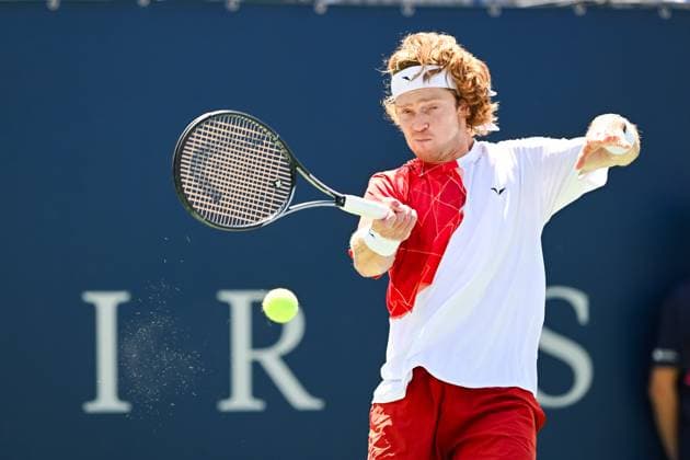 MONTREAL, QC - AUGUST 10: Andrey Rublev returns the ball during a third round match at ATP, Tennis Herren National Bank Open on August 10, 2024 at IGA Stadium in Montreal, QC (Photo by David Kirouac Icon Sportswire) TENNIS: AUG 10 National Bank Open EDITORIAL USE ONLY Icon240810058