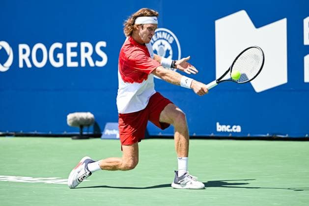 MONTREAL, QC - AUGUST 10: Andrey Rublev returns the ball during a third round match at ATP, Tennis Herren National Bank Open on August 10, 2024 at IGA Stadium in Montreal, QC (Photo by David Kirouac Icon Sportswire) TENNIS: AUG 10 National Bank Open EDITORIAL USE ONLY Icon240810061