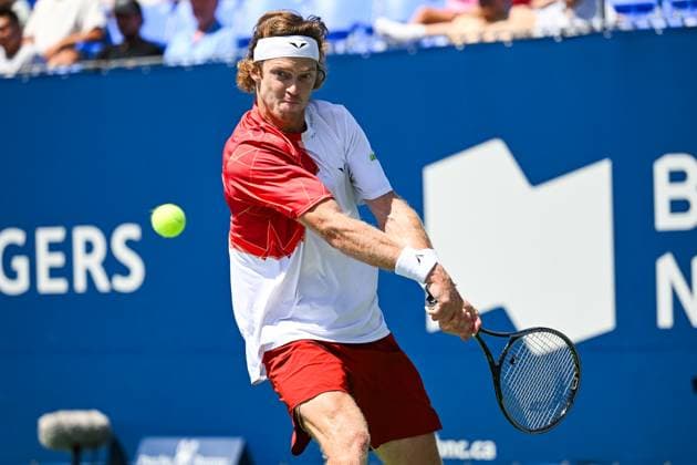 MONTREAL, QC - AUGUST 10: Andrey Rublev returns the ball during a third round match at ATP, Tennis Herren National Bank Open on August 10, 2024 at IGA Stadium in Montreal, QC (Photo by David Kirouac Icon Sportswire) TENNIS: AUG 10 National Bank Open EDITORIAL USE ONLY Icon240810062