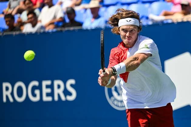 MONTREAL, QC - AUGUST 10: Andrey Rublev returns the ball during a third round match at ATP, Tennis Herren National Bank Open on August 10, 2024 at IGA Stadium in Montreal, QC (Photo by David Kirouac Icon Sportswire) TENNIS: AUG 10 National Bank Open EDITORIAL USE ONLY Icon240810063