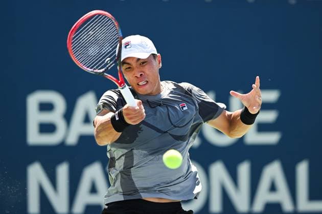 MONTREAL, QC - AUGUST 10: Brandon Nakashima (USA) returns the ball during a third round match at ATP, Tennis Herren National Bank Open on August 10, 2024 at IGA Stadium in Montreal, QC (Photo by David Kirouac Icon Sportswire) TENNIS: AUG 10 National Bank Open EDITORIAL USE ONLY Icon240810067