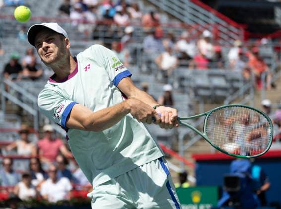 August 10, 2024, Montreal, Pq, Canada: Poland s Hubert Hurkacz returns a shot to Australia s Thanasi Kokkinakis during their match at the men s National Bank Open tennis Saturday, August 10, 2024 in Montreal. Hurkacz won the match in three sets. Hubert Hurkacz,  - ZUMAc35_ 20240810_zaf_c35_075 Copyright: xRyanxRemiorzx