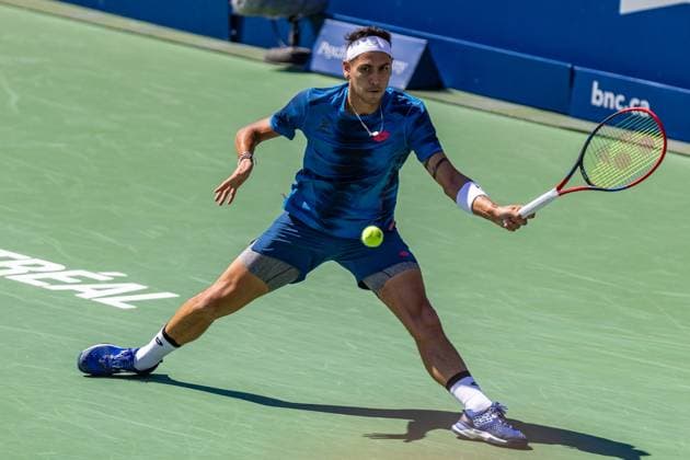 August 10, 2024, Montreal, Quebec, Canada: ALEJANDRO TABILO from Chile forehand shot in second set against Jannik Sinner from Italia in third round of Canadian Open at IGA Stadium in Montreal, Quebec, Canada. View from stand Montreal Canada - ZUMAl189 20240810_zsp_l189_024 Copyright: xYannickxLegarex