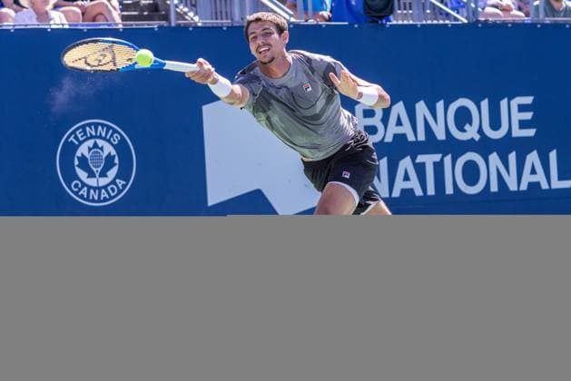 August 10, 2024, Montreal, Quebec, Canada: ALEXEI POPYRIN from Australia stretching to reach the ball in first set against GRIGOR DIMITROV from Bulgaria in third round of Canadian Open at IGA Stadium in Montreal, Quebec, Canada Montreal Canada - ZUMAl189 20240810_zsp_l189_030 Copyright: xYannickxLegarex